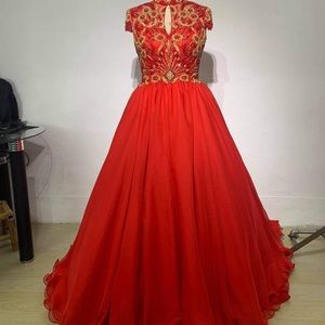 Beautiful red gown with lots of beading